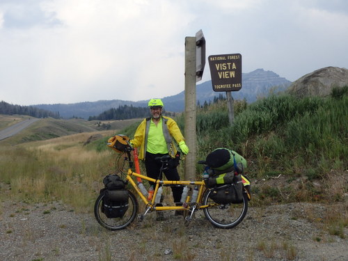 GDMBR: Dennis Struck and the Bee at the Vista View of Togwotee Pass (at the top of the hill in this picture), Grand Teton National Forest, Wyoming.